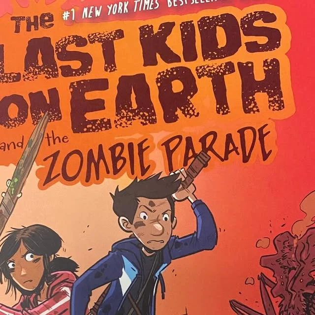 Bright orange younger-reader graphic novel cover with illustrated characters